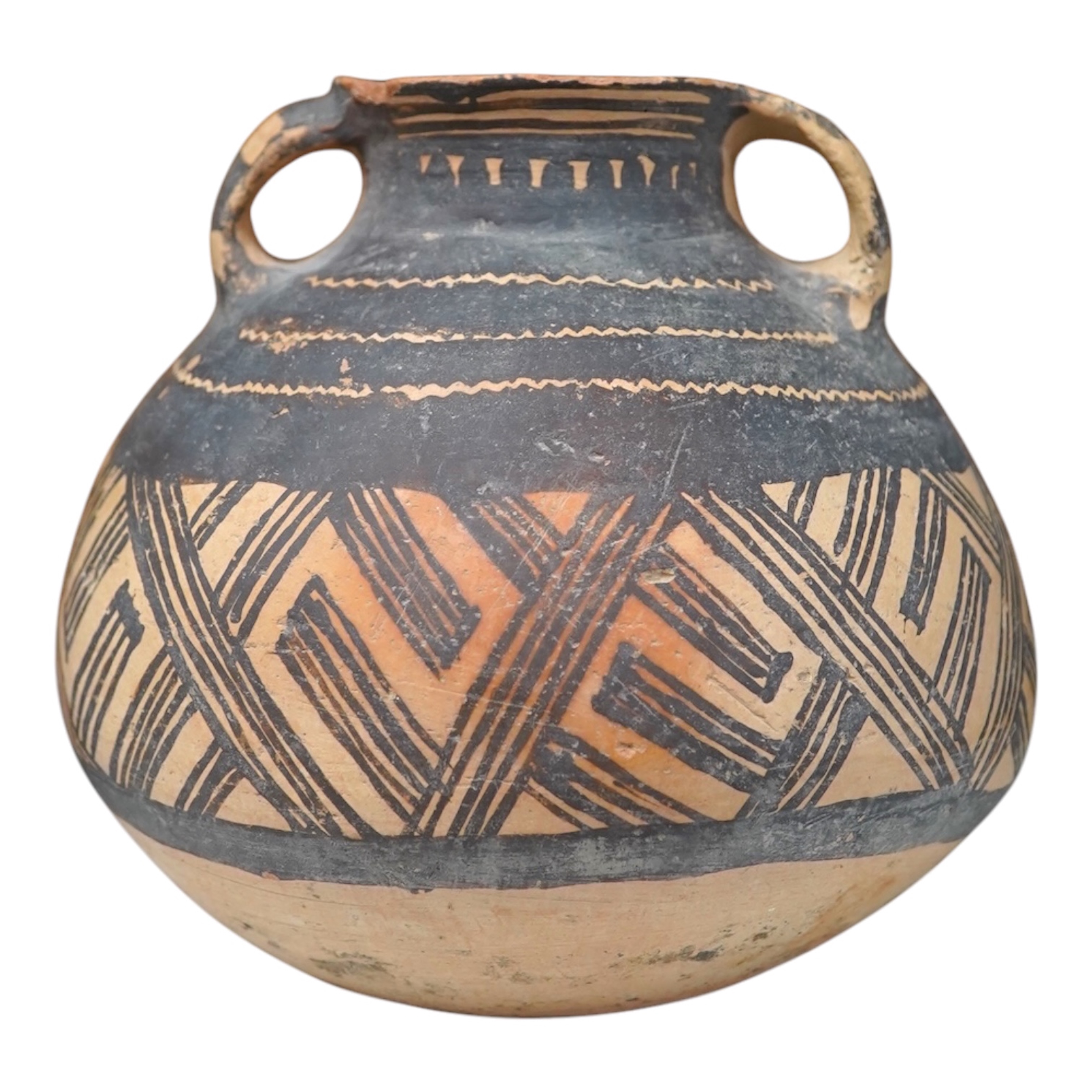 A Chinese neolithic pottery two handled jar - 14cm tall, Provenance: the vendor‘s parents lived in Hong Kong from 1947 and bought the jar from a specialist dealer before 1980. Condition - fair to good